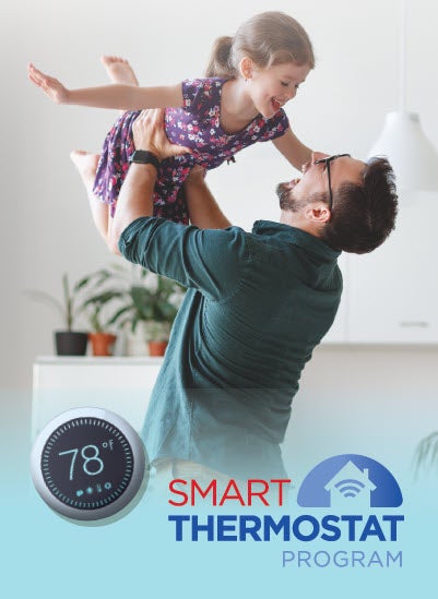 Smart Thermostat program - Man holding a child